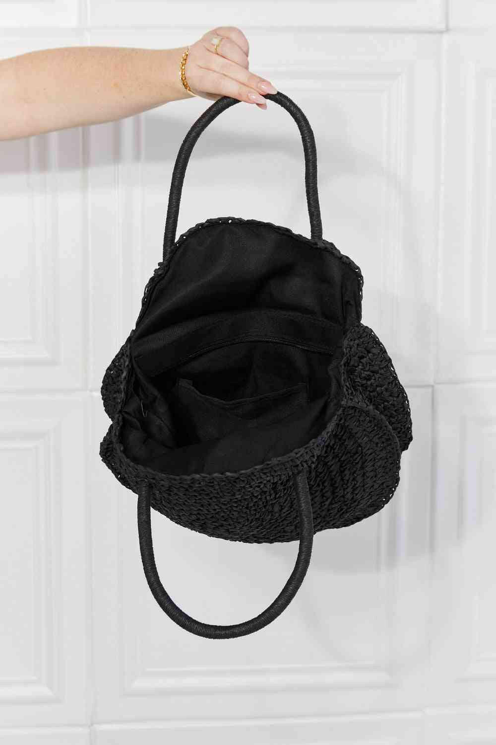 Justin Taylor Beach Date Straw Rattan Handbag in Black.