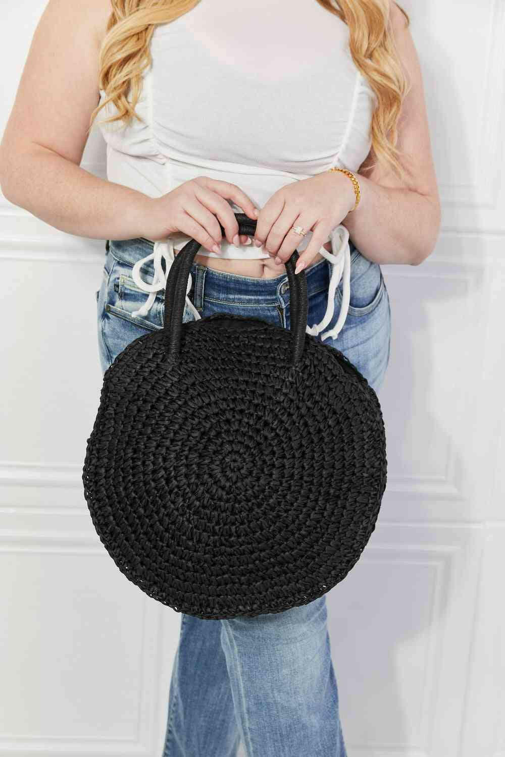 Justin Taylor Beach Date Straw Rattan Handbag in Black.