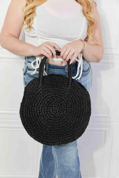 Justin Taylor Beach Date Straw Rattan Handbag in Black.