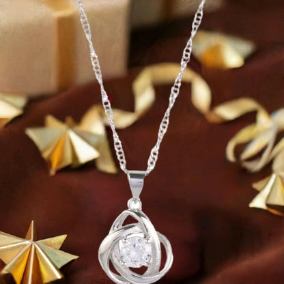 Round Knot Pendant Necklace with Cubic Zirconia.