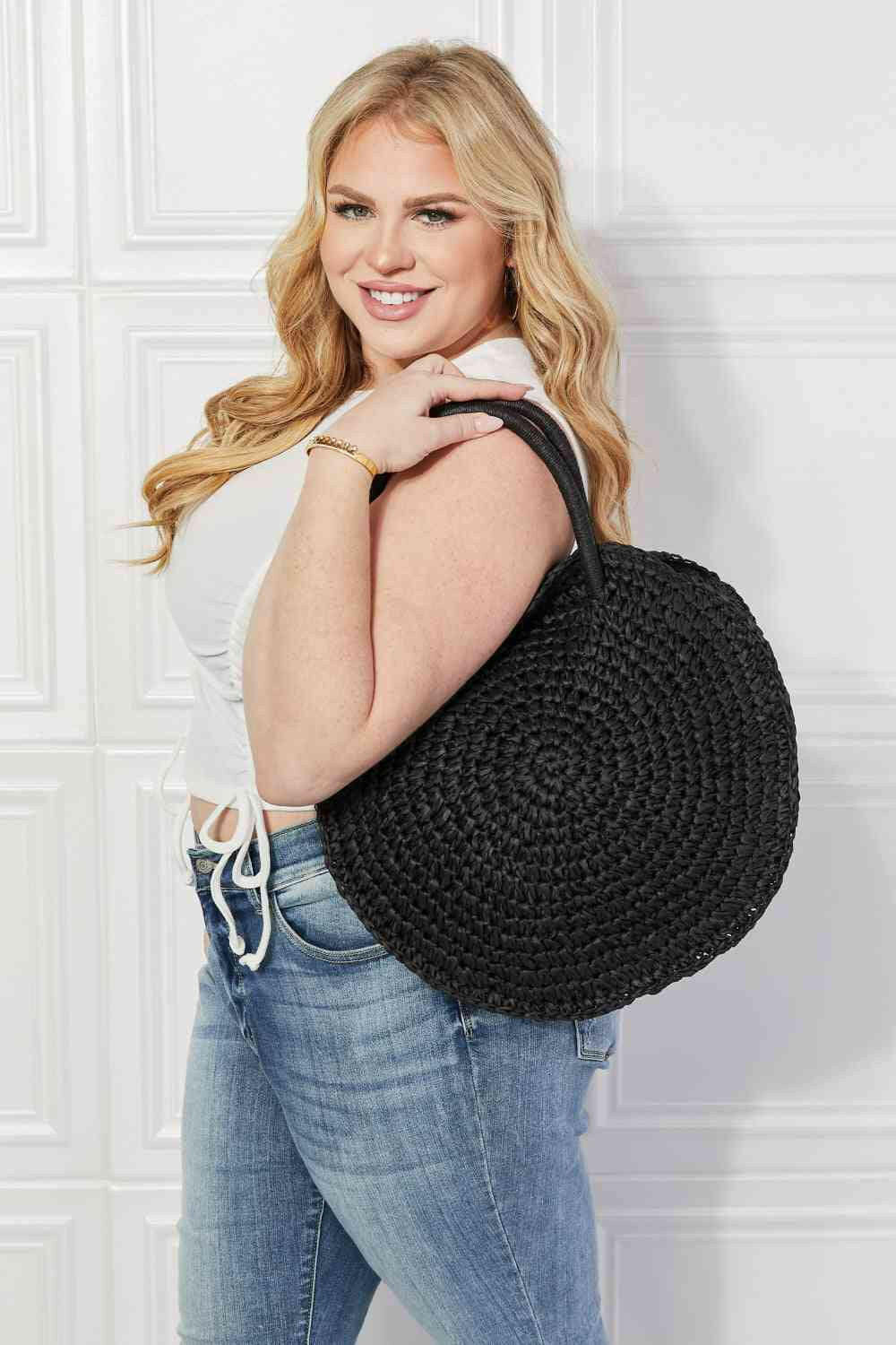 Justin Taylor Beach Date Straw Rattan Handbag in Black.